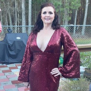 Sequent red evening gown. Size 4 wore once size 6 never worn new with tags on.